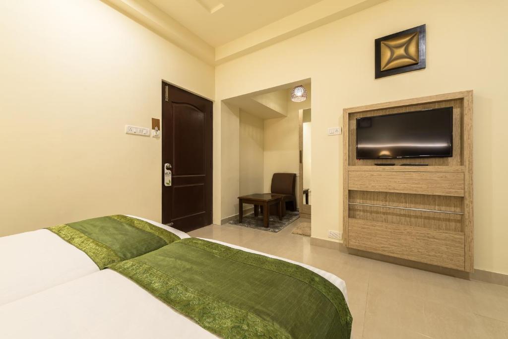 Двухместный ([Sanitized] Deluxe Double or Twin Room), Treebo Nestlay Casa