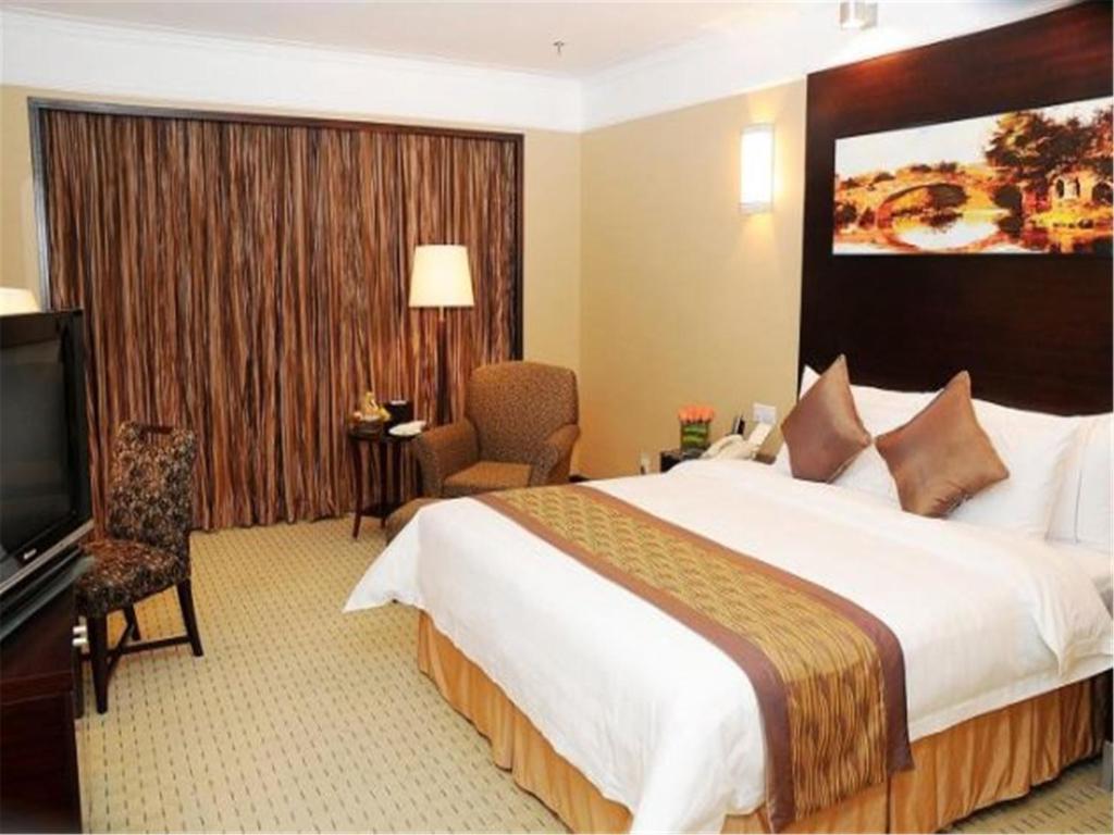 Двухместный (Улучшенный двухместный номер с 1 кроватью), Qingdao Blue Horizon Hotel - Laoshan