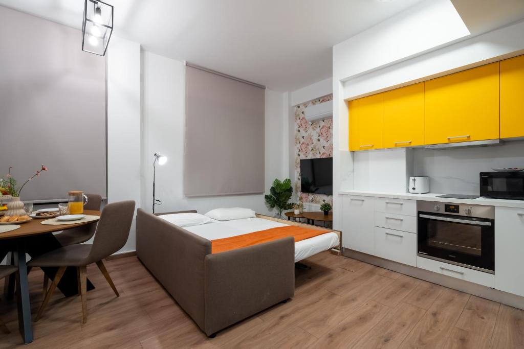 Strefi Hill Suites - Tap to explore photos