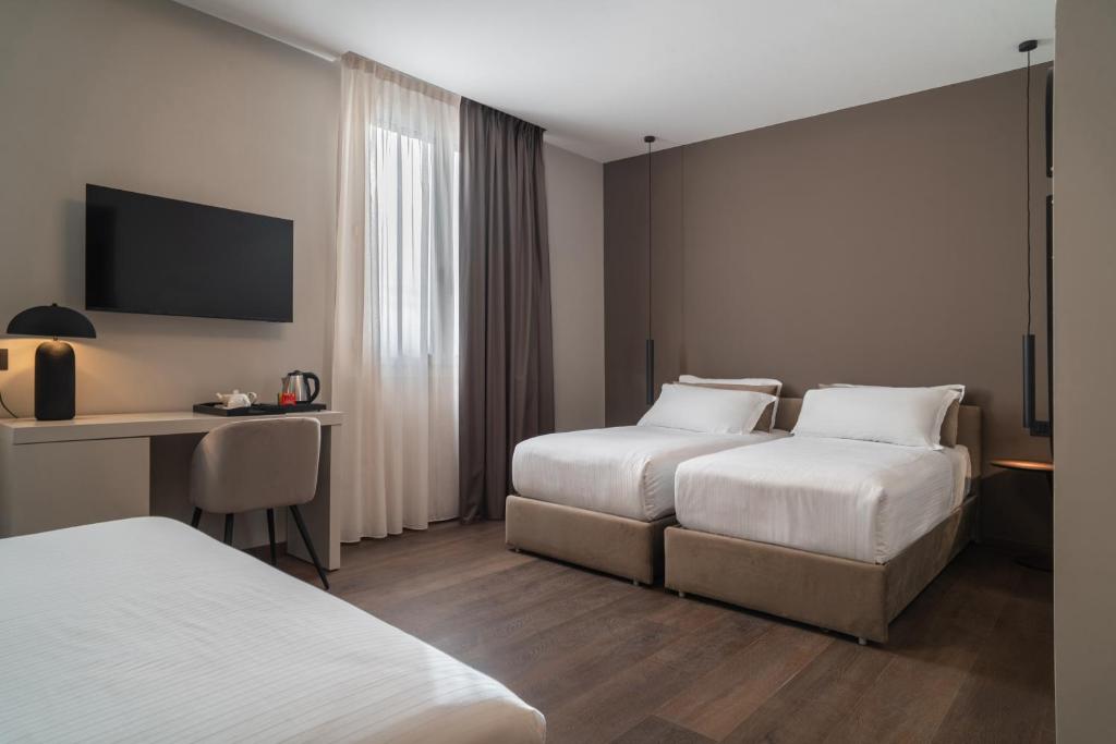 Hotel Porpora Suite - Tap to explore photos