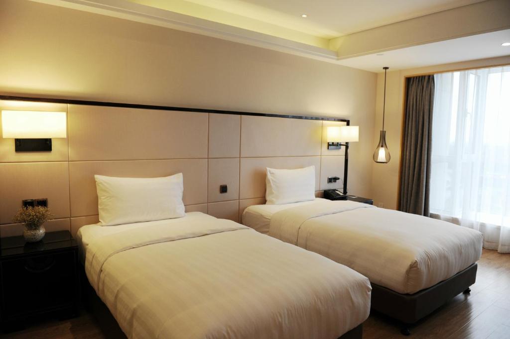 Двухместный (Classic City View Twin Room), Pullman Qingdao Ziyue