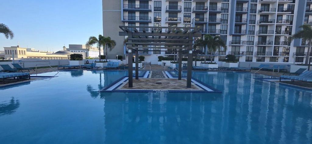 Modern Hotel with Pool & Gym in Prime Doral Location - Tap to explore photos