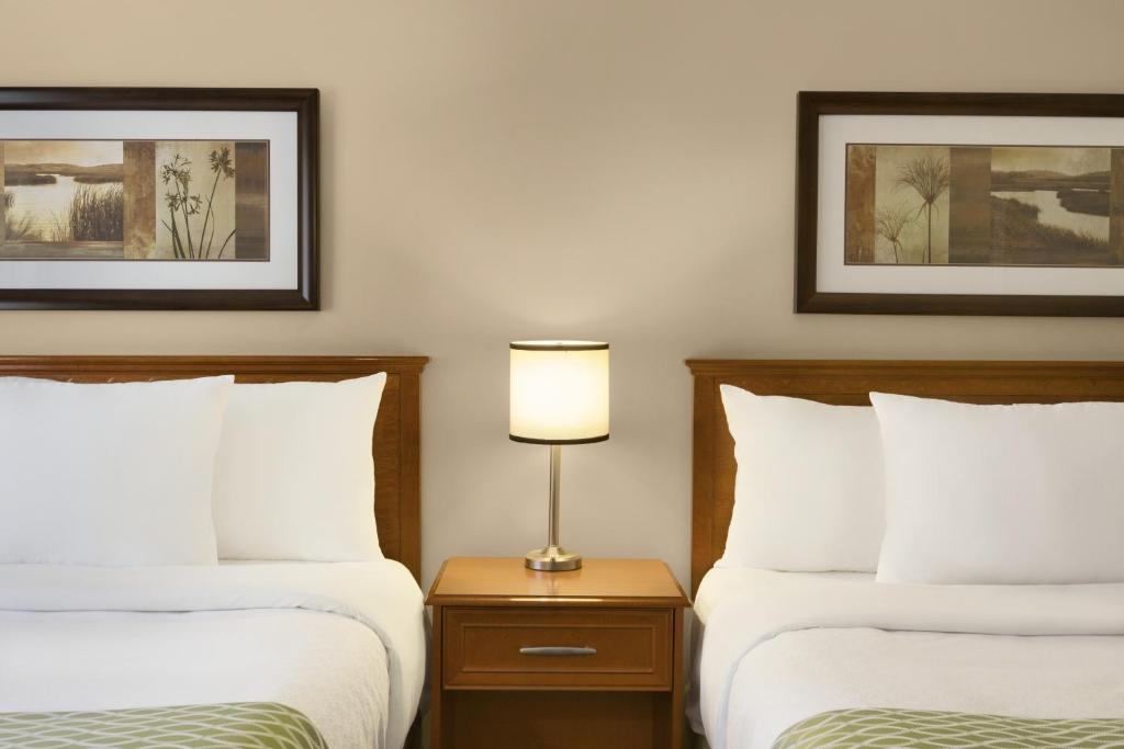 Colonial Square Inn & Suites Room Type - Queen Room with Two Queen Beds - Second Floor Colonial Square Inn & Suites Room Type - Queen Room with Two Queen Beds - Second Floor