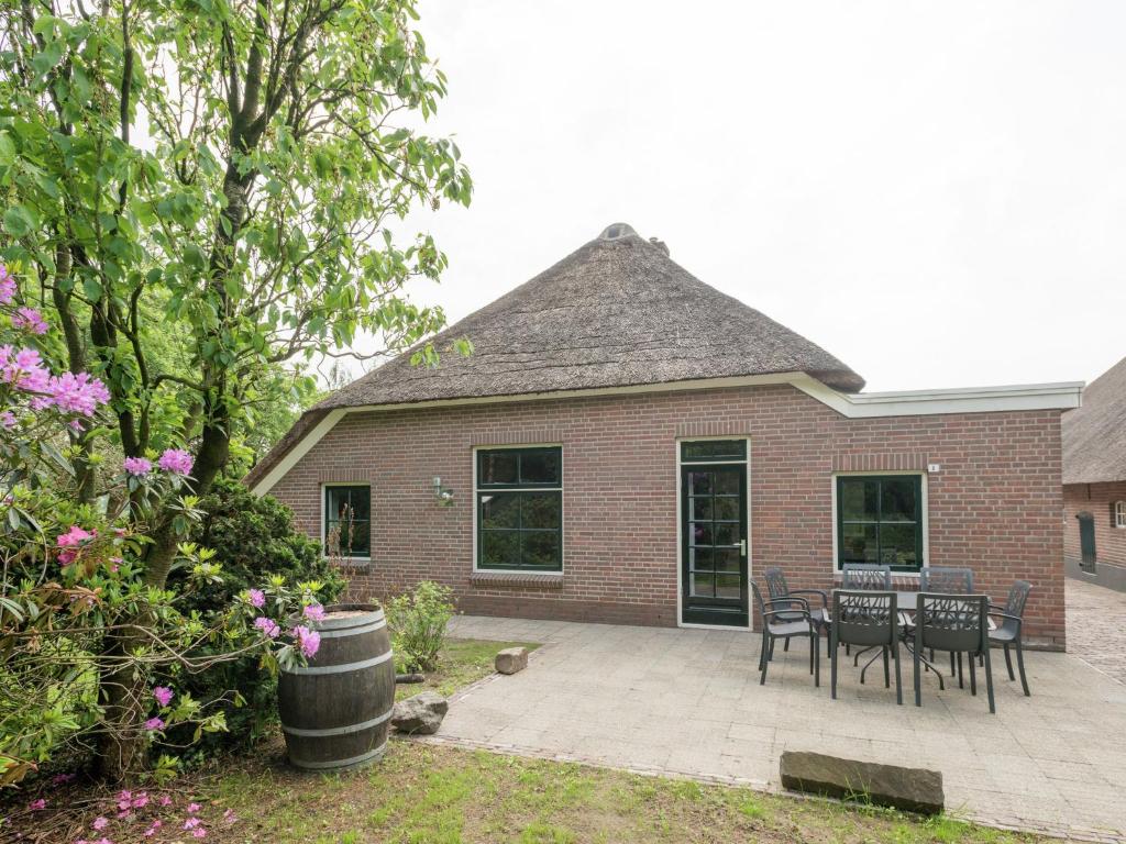 Attractive holiday home with a wood stove, located on a farm photo 1