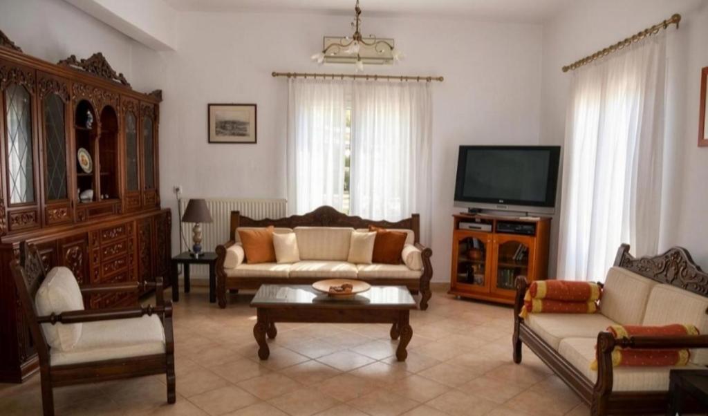 Aegina House - Tap to explore photos