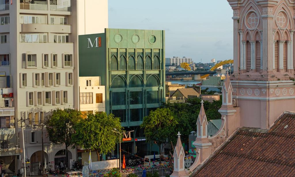 M Village Hotel Da Nang Centre, a brand of Modern Village Lifestyle - Tap to explore photos