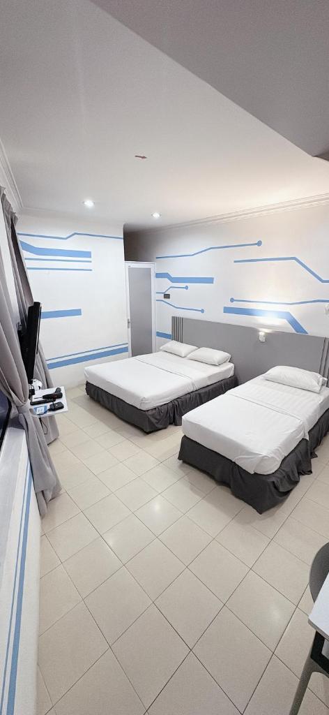 One Stop Hotel Ipoh - Tap to explore photos