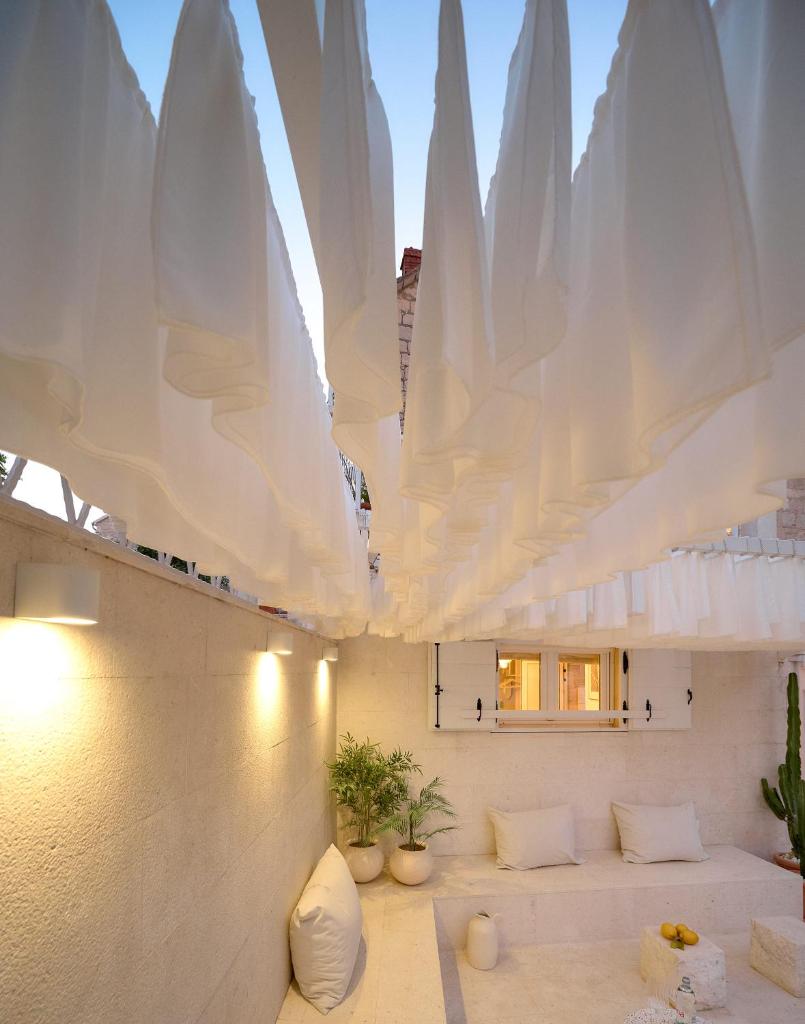 Ibella Boutique Rooms - Tap to explore photos