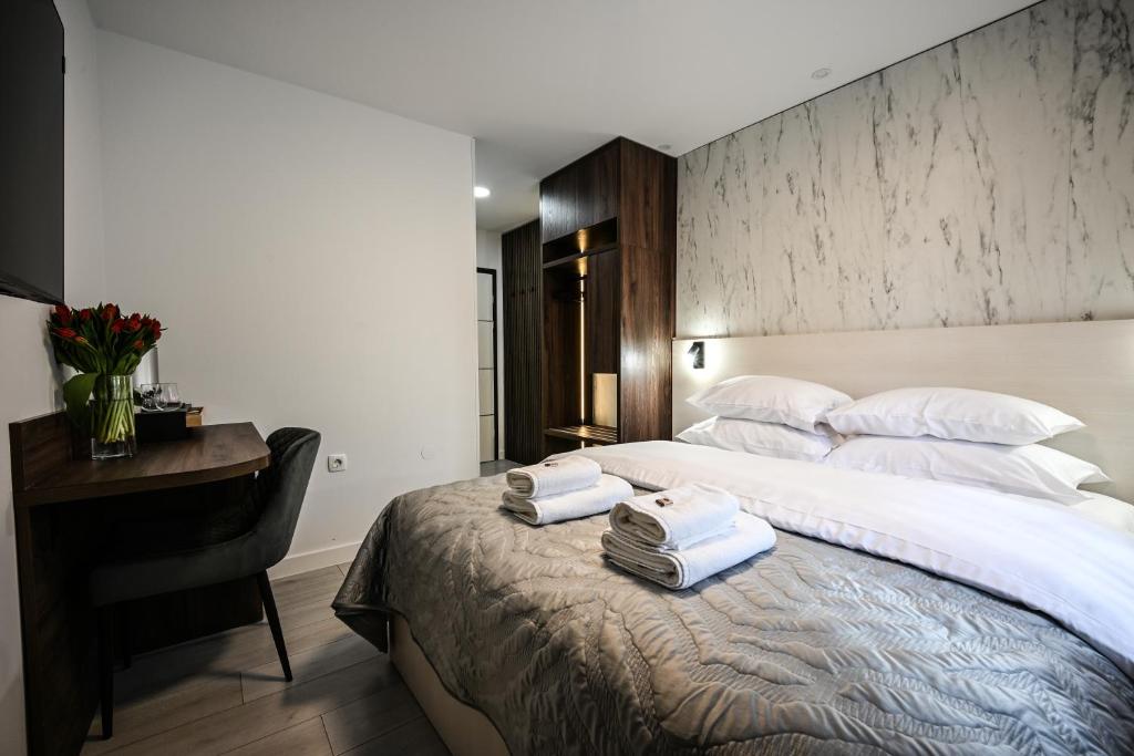 Laurea Rooms - Tap to explore photos