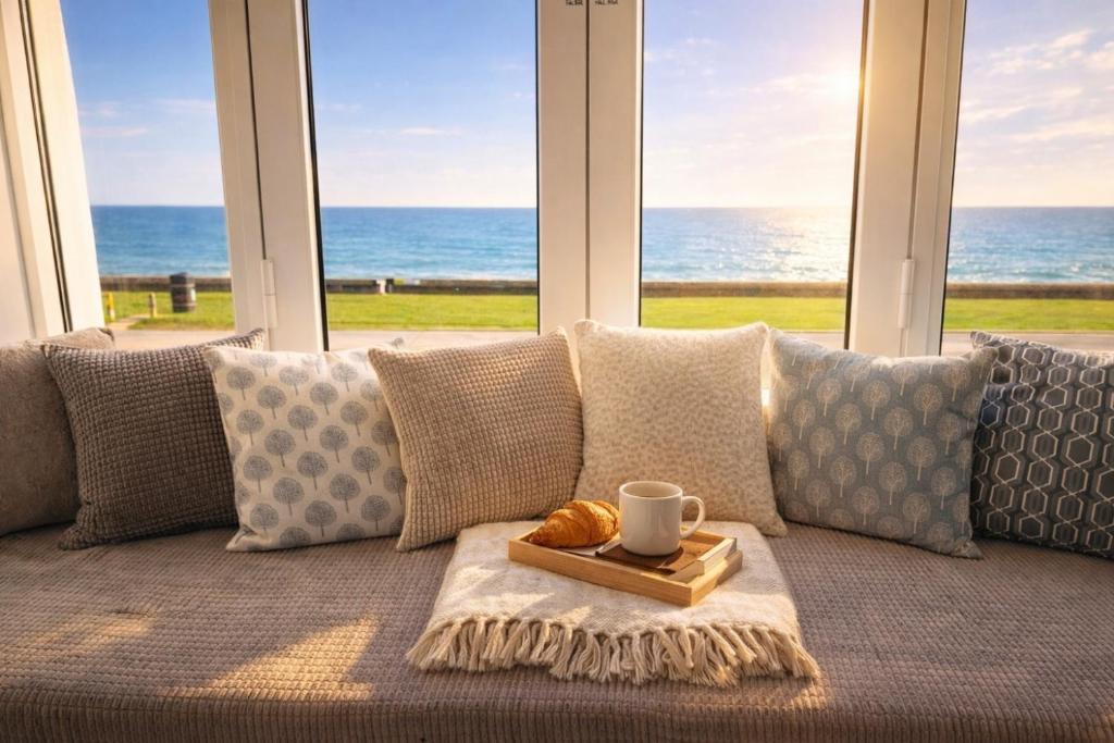 Beachfront Studio with Sea Views & AC, The Compact Coastal Crib - Tap to explore photos