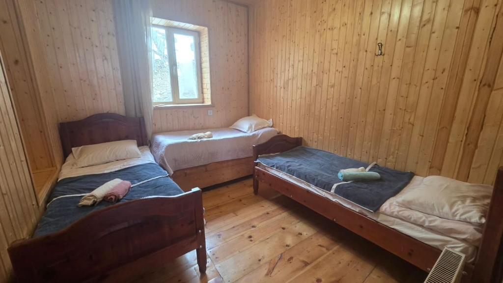 Nino & Tarzan Guesthouse Room Type - Triple Room with Shared Bathroom