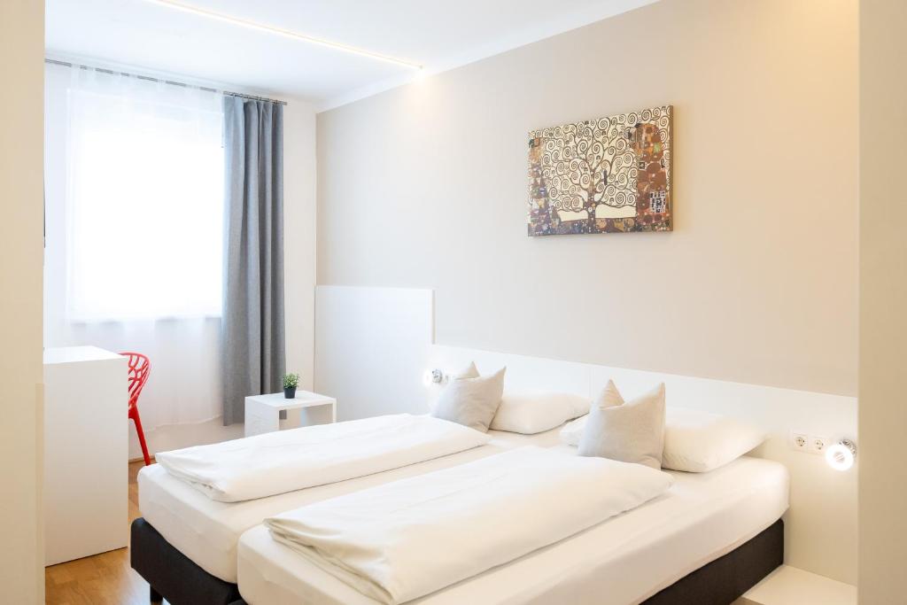 sHome Self-Check-in Hotel Graz - Tap to explore photos