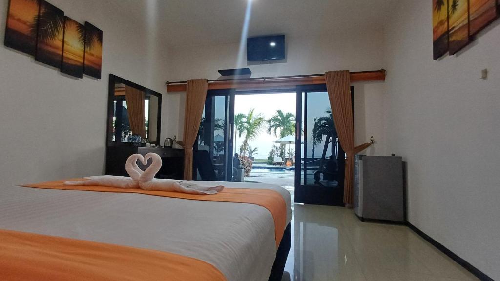Melaya Beach Resort Queen Bed - Tap to explore photos