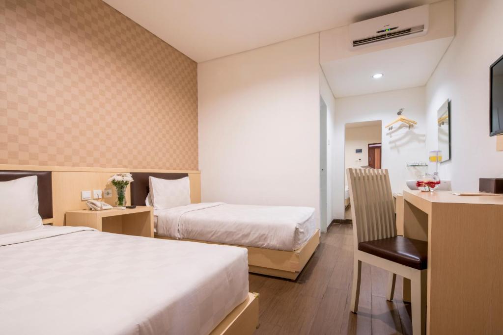 Двухместный (Двухместный номер Делюкс с 2 отдельными кроватями), Hotel 88 Grogol