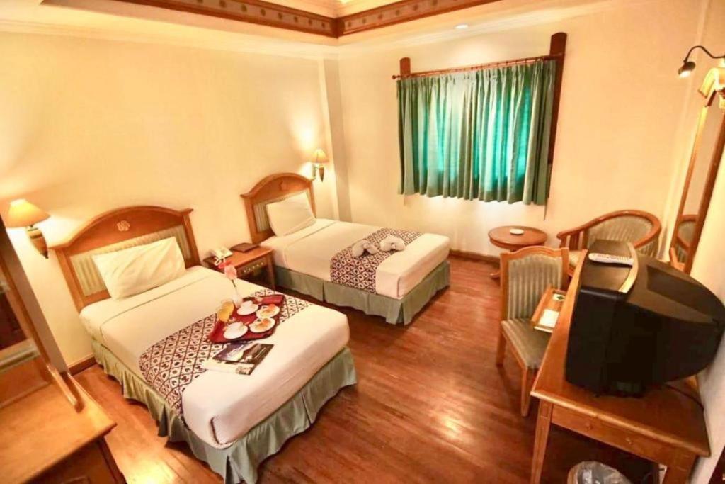 Kresna Hotel Wonosobo - Tap to explore photos