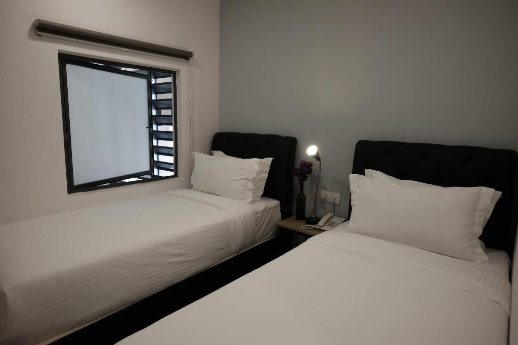 Двухместный (Двухместный номер Делюкс с 2 отдельными кроватями), B Lot Hotel