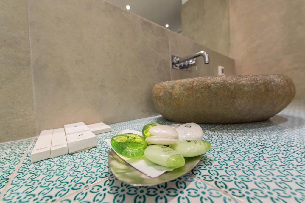 Santorini Secret Suites & Spa - Tap to explore photos