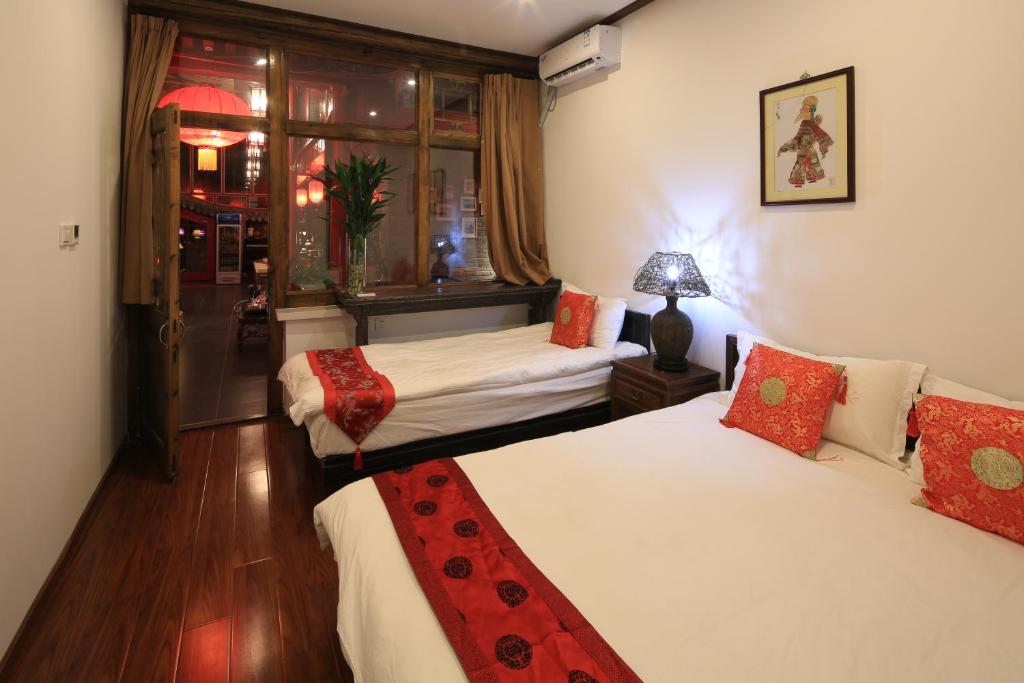 The Great Wall Courtyard Hostel - Tap to explore photos