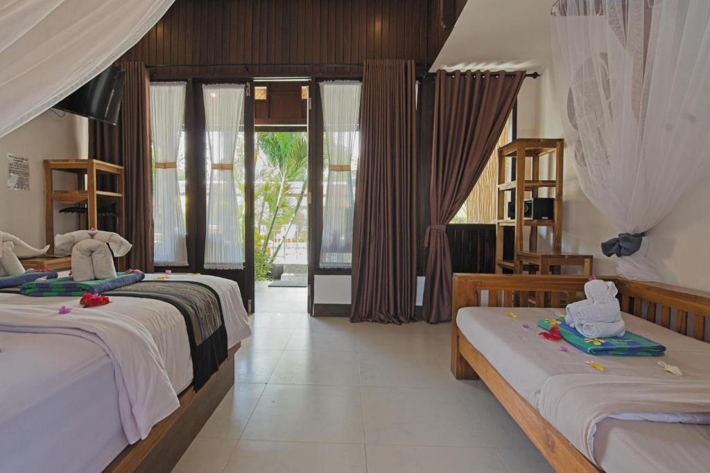 Gili Air Bungalows - Tap to explore photos