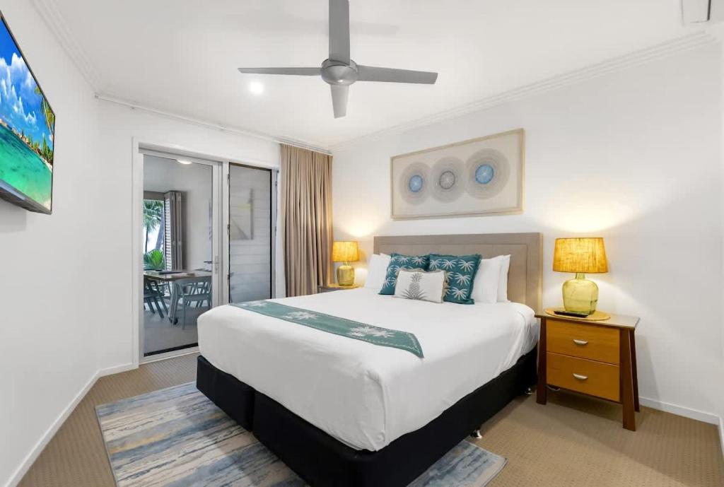 Aqua Aura - Bask in Beachfront Living - Tap to explore photos
