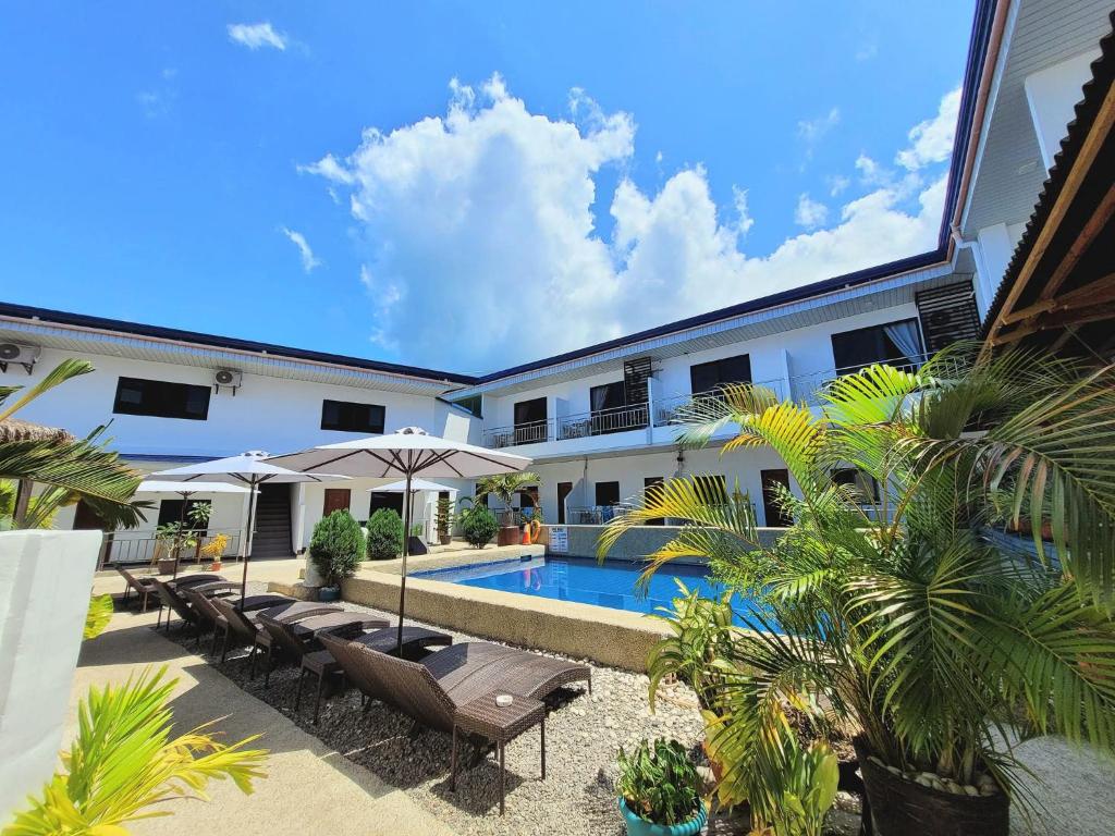MGH Alona Resort - Tap to explore photos
