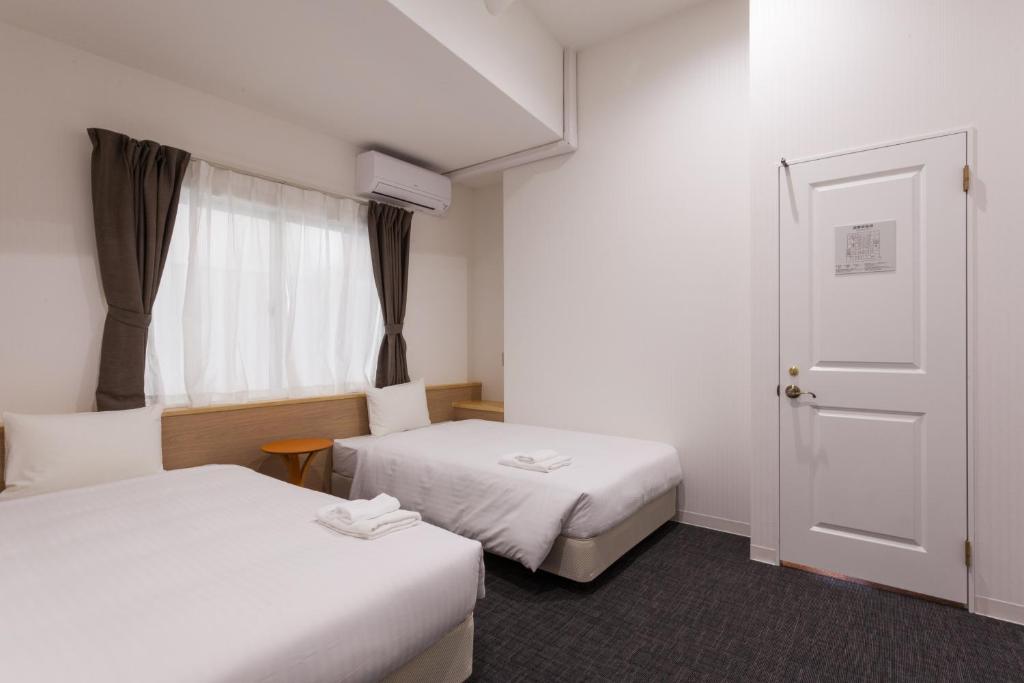 HOTEL THE CUBE Naha Kokusai Street - Tap to explore photos