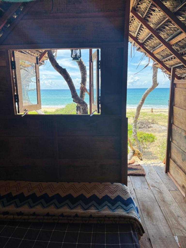 Wana beach camp - Tap to explore photos