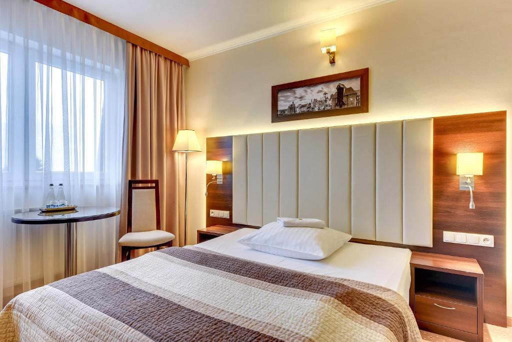 Трехместный (Семейный номер (для 2 взрослых и 1 ребенка)), Amber Hotel