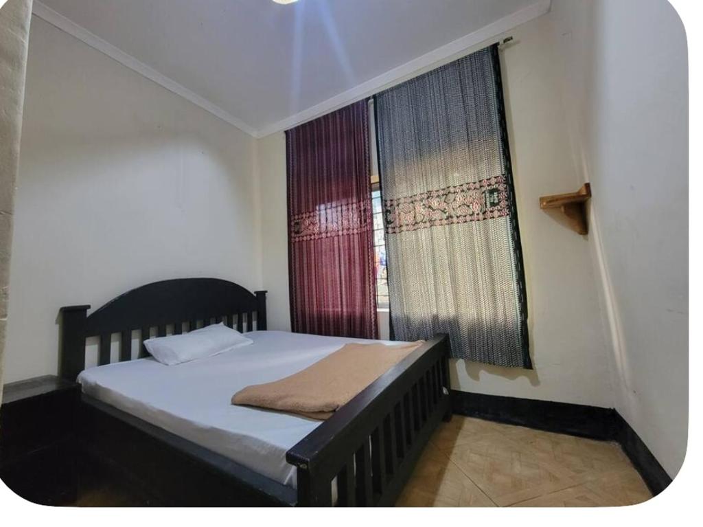 Iringa Hillside backpackers - Tap to explore photos