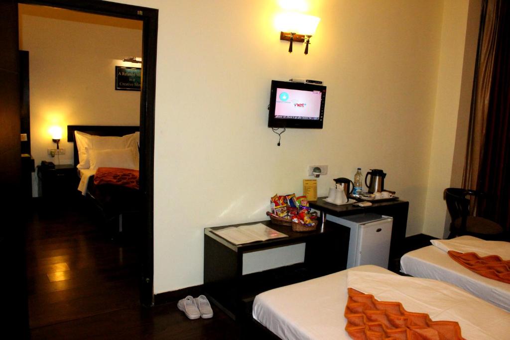 Семейный (Фешенебельный семейный номер с 4 спальными местами), Hotel Hong Kong Inn