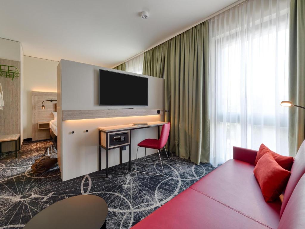 ibis Styles Magdeburg - Tap to explore photos
