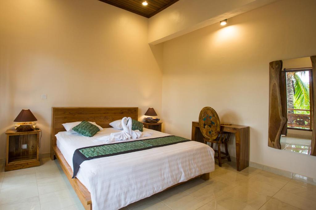 Двухместный (Двухместный номер с 1 кроватью и патио), Bulan Bali Homestay & Hostel