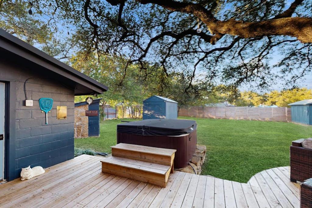 Blue Haus with Hot Tub, Shuffleboard, EV Charger - Walk to Town & Wineries - Tap to explore photos