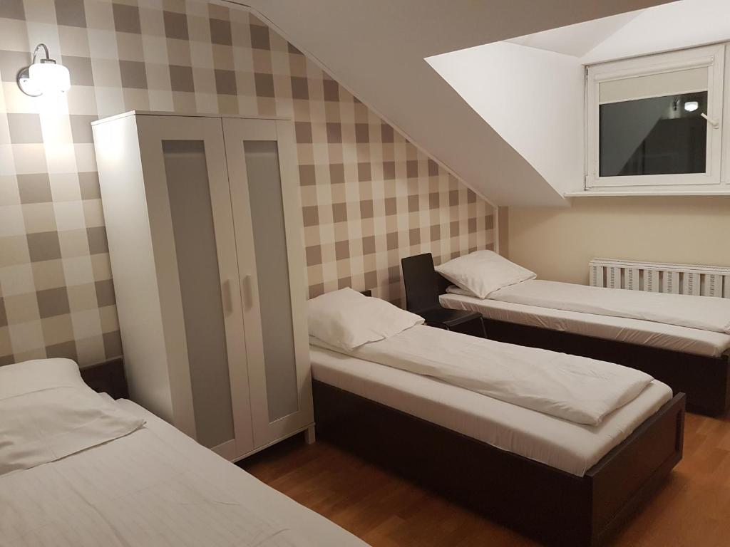 Трехместный (Трехместный номер эконом-класса с общей ванной комнатой), Duszka Hostel
