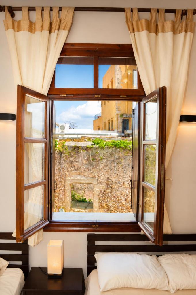 Enetiko Rooms - Tap to explore photos