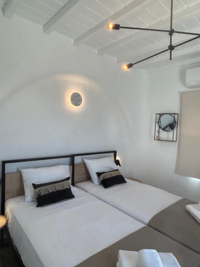 Apellōn Mykonos Luxury Seaview Retreat - Tap to explore photos