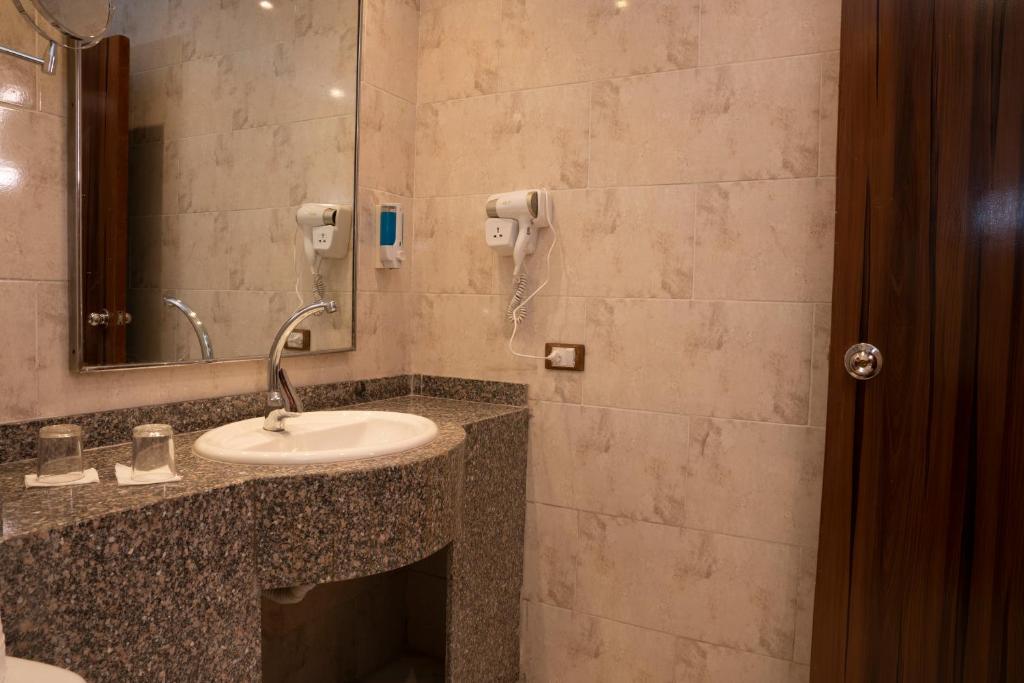 DEXON ROMA HOTEL - Tap to explore photos