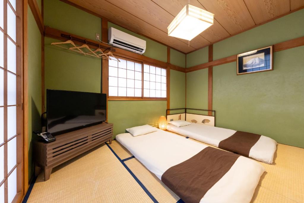 Nishikujo Private House near USJ - Tap to explore photos