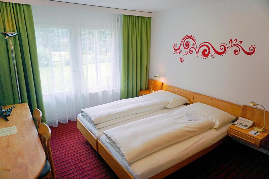 Typically Swiss Hotel Altana - Tap to explore photos
