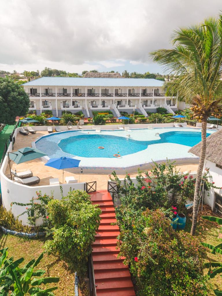 Canary Kendwa Beach Resort - Tap to explore photos