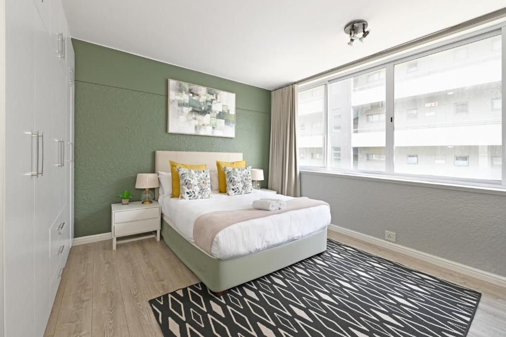 Charming Central Sea Point Haven 50m to Ocean - Tap to explore photos