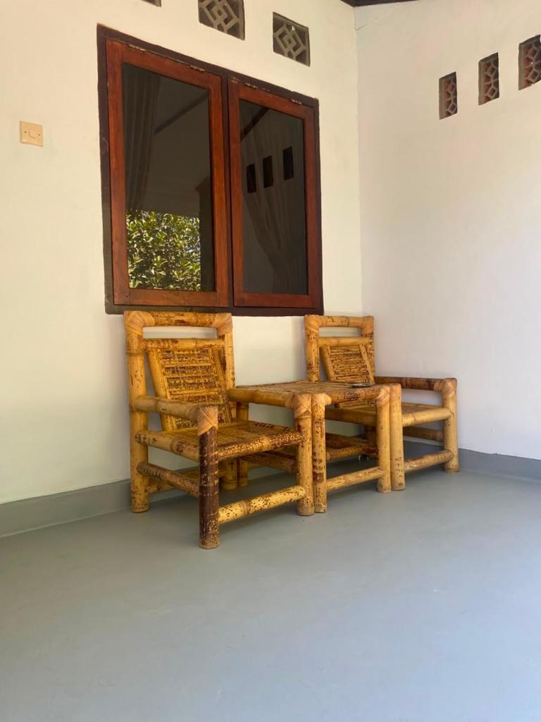 Palm Homestay Kuta - Tap to explore photos
