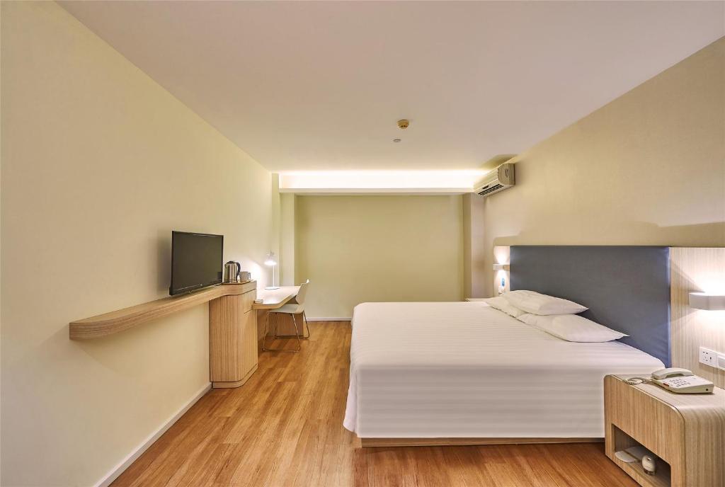 Двухместный (Улучшенный двухместный номер с 1 кроватью), Hanting Hotel Shanghai Tangqiao Subway Station