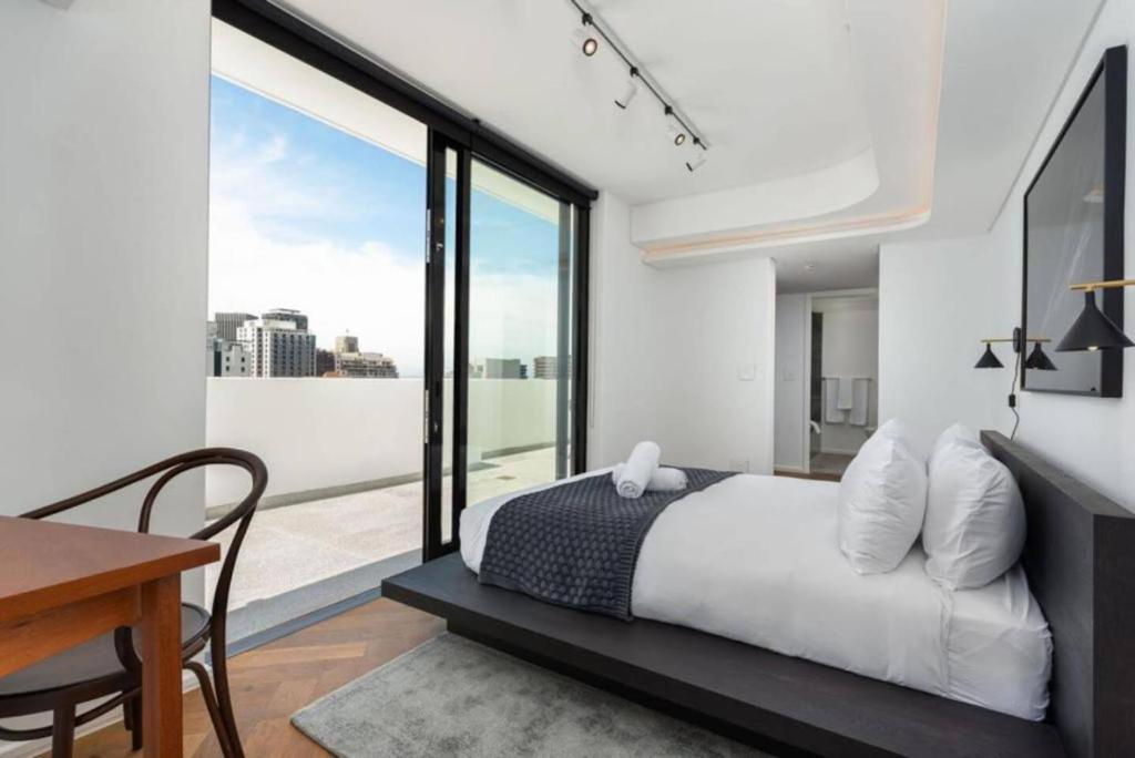 Central City Penthouse With Exquisite Views - Tap to explore photos