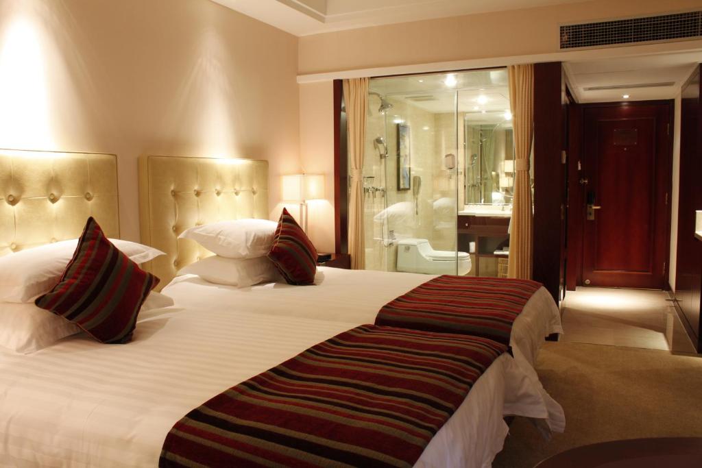 Двухместный (Двухместный номер Делюкс с 2 отдельными кроватями), New Century Hotel Ningbo