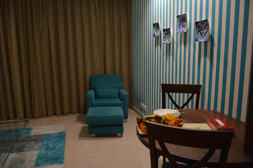 Markazia Suites - Tap to explore photos