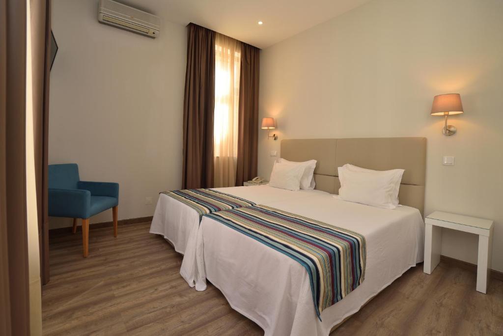 Двухместный (Двухместный номер с 2 отдельными кроватями), Porto Domus Hotel