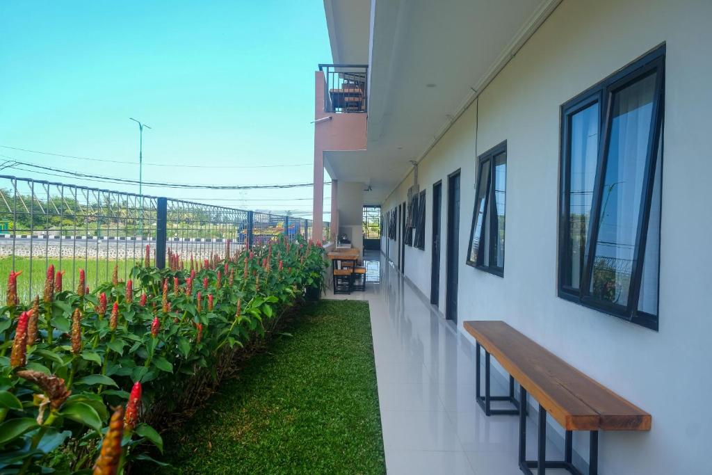 Urbanview keTemon Hotel & Resto YIA by RedDoorz - Tap to explore photos
