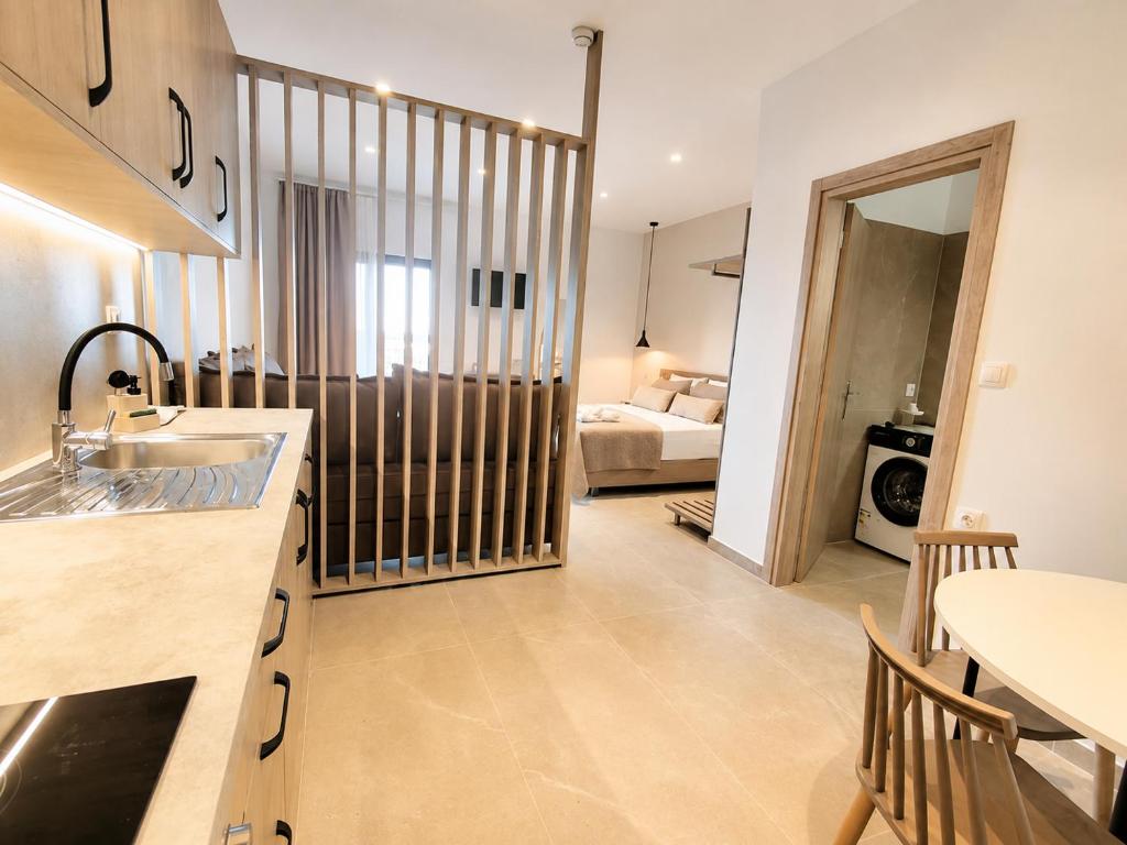 Soula Apartments & Studios - Tap to explore photos