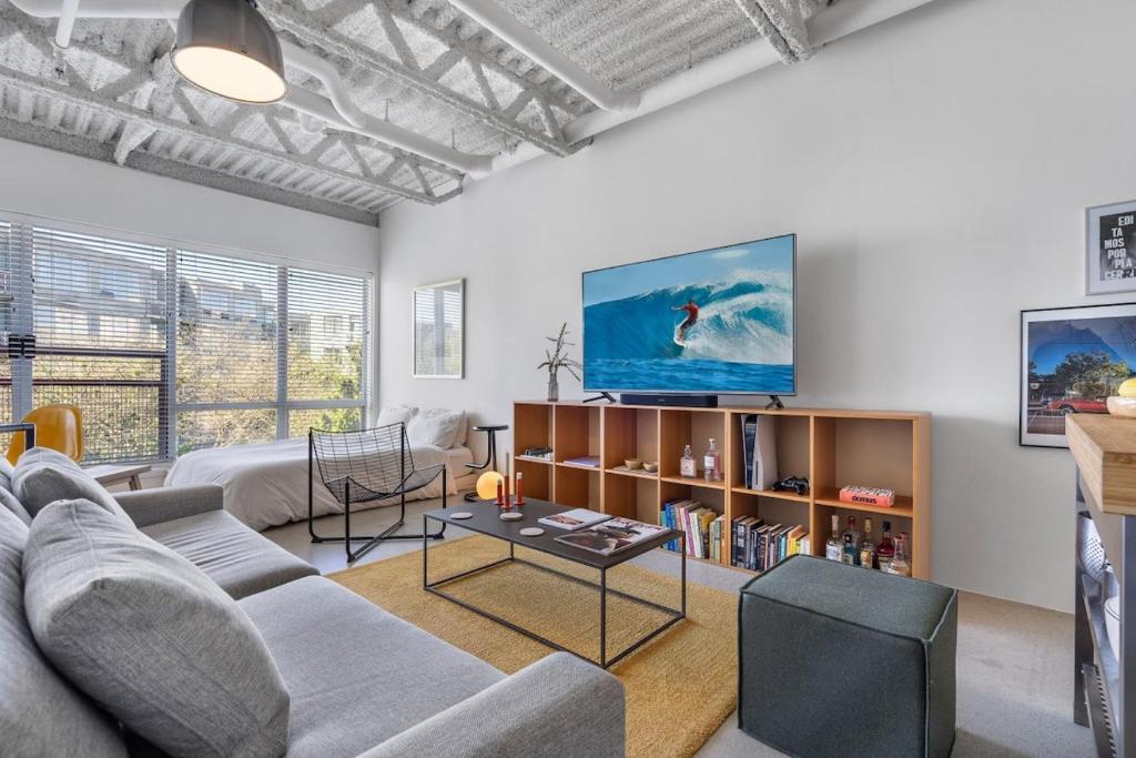 Modern and Specious Condo right off Main St - Tap to explore photos